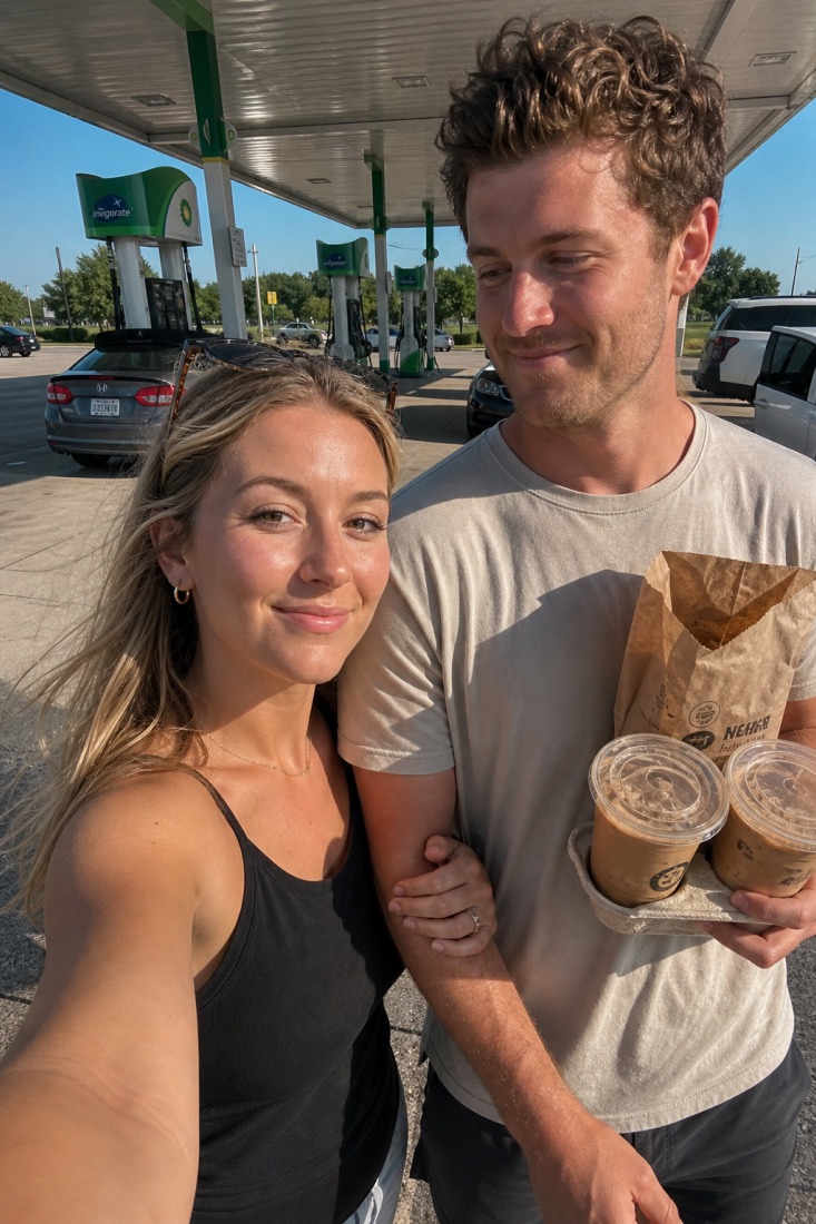 A couple holding coffees